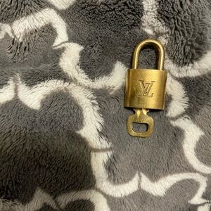 Louis Vuitton Gold Padlock with Key